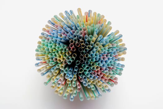 Many drinking straws in a container looking down