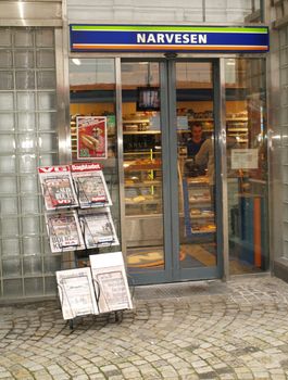 kiosk in Norway with newspapers outside