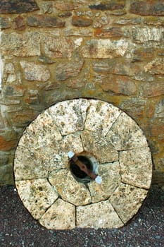 A old limestone mill stone