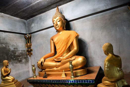 Buddha statue inside a temple in Khao Lak, Thailand - travel and tourism.