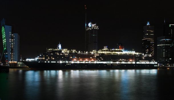 ROTTERDAM, THE NETHERLANDS, JULY 09-Cruiseship Queen Victoria in harbour by night on July 12, 2009