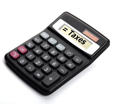 tax or taxes concept with business calculator and word