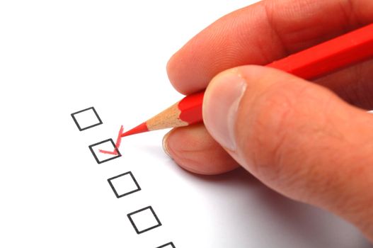 checkbox and red pen showing customer service survey or satisfaction concept to improve sales