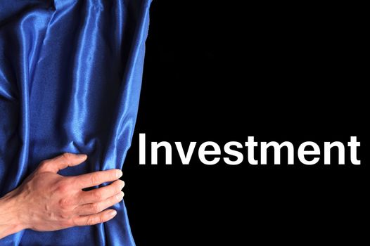 invest in your future concept with blue curtain hand and black background