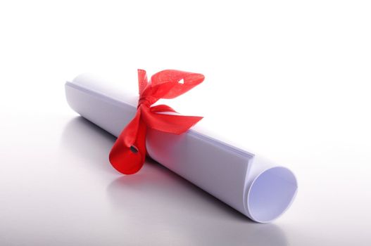 diploma isolated on a white background with copyspace for text message
