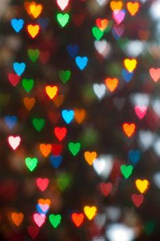 A creative picture of some christmas lights using a bokeh hearts filter.