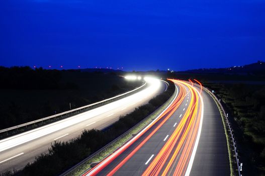 night traffic motion blur on highway showing car or transportation concept