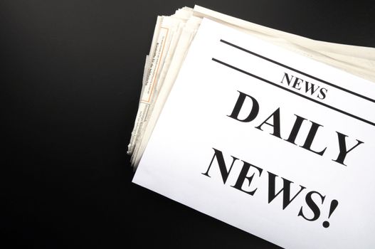 newspaper newsletter or news concept with pile of papers