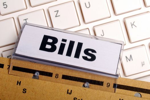 bill or bills word on paper riders showing payment or debts concept