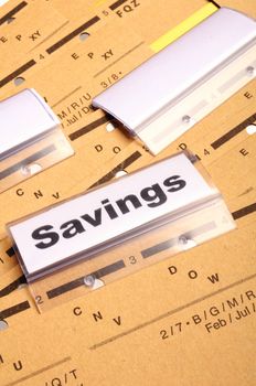 savings word on business folder showing saving money concept