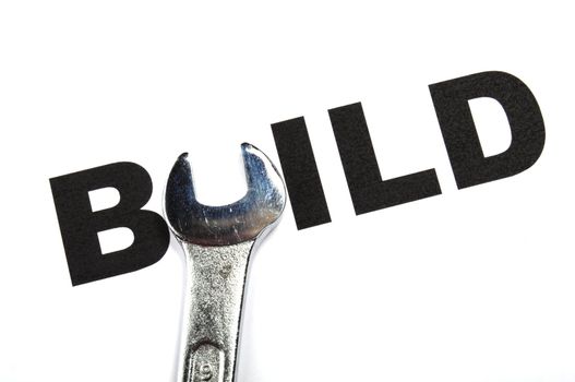 build and tools showing construction concept with word