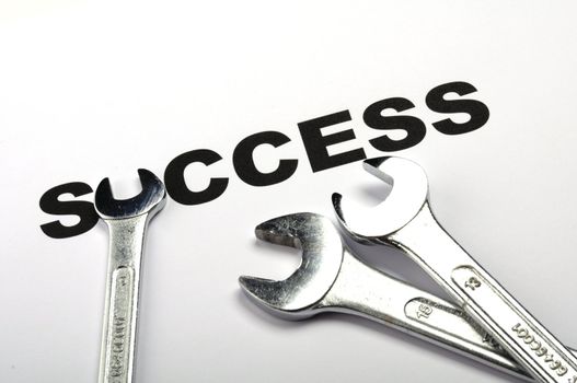 success concept with word and tool showing business growth