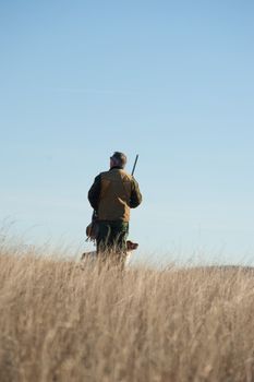 A hunter and his dog, a strong parntership