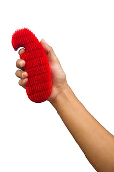 isolated hand with scrubbing brush, clipping path is in jpg.