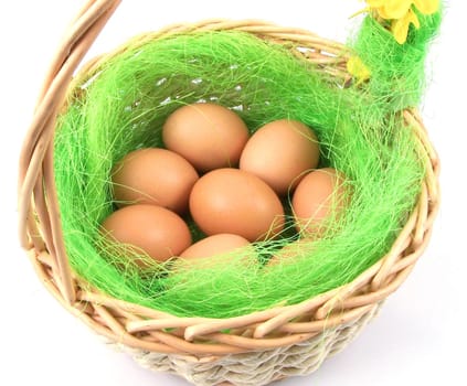 wicker basket with eggs