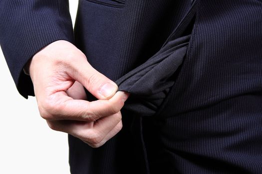 young male shows empty pockets in his trousers, business concept, studio shoot isolated on white background 