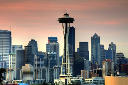 Seattle skyline under red sky at sunrise