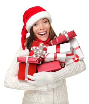 Santa hat Christmas woman holding christmas gifts smiling happy and excited. Cute beautiful multi-racial Caucasian Asian santa girl isolated on white background.