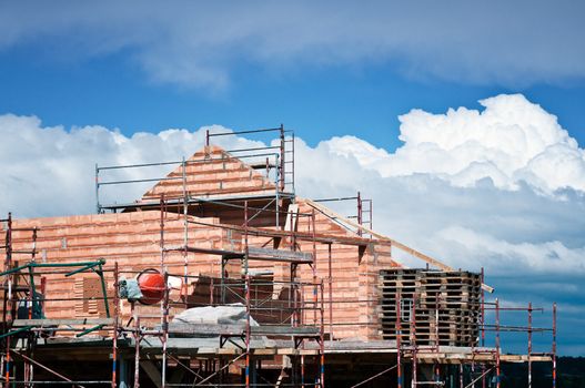 New house under construction with a Cloudscape