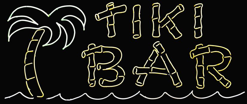 A neon glowing tiki bar sign