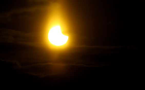 Partial solar eclipse visible in the sky above Brno, 4 January 2010 in Brno, Czech Republic
