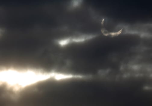 Partial solar eclipse visible in the sky above Brno, 4 January 2010 in Brno, Czech Republic