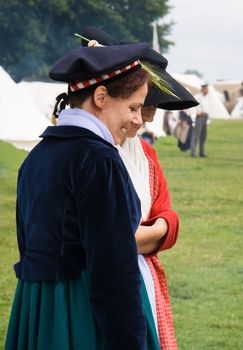 WATERLOO, BELGIUM, JUNE 21, 2009 - History enthusiasts from 24 countries  take part in the re-enactment of the battle of Waterloo that in 1815 ended Napoleon's imperial dream. Ladies in camp