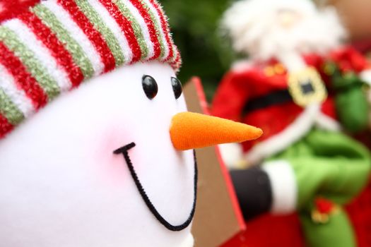 Christmas background with Santa and snowm close up