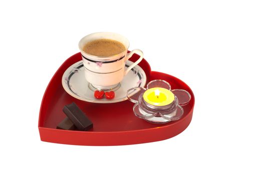 Romantic breakfast with chocolate on red heart shaped tray