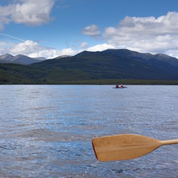 Tandem Kayak on Quiet Lake, Yukon T., Canada