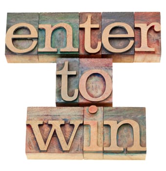 enter to win - isolated text in vintage wood letterpress printing blocks