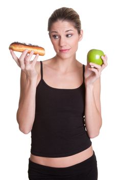 Diet woman holding donut apple