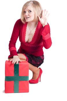 Happy woman with Christmas presents isolated on white