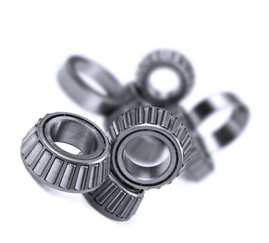 Ball bearings on a pure white background with space for text