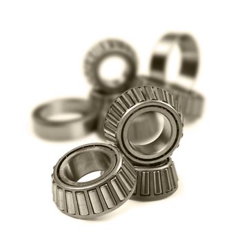 Ball bearings on a pure white background with space for text