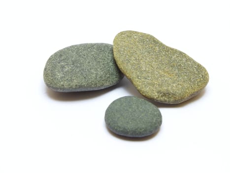 Three gray stones isolated on white background