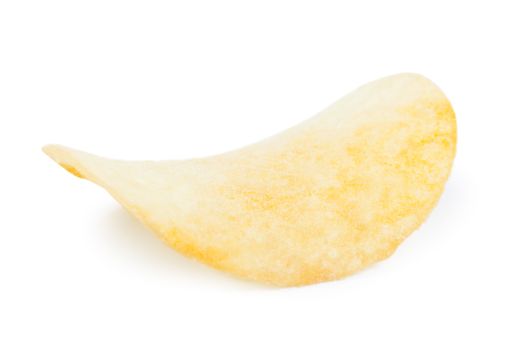 Macro view of salted potato chip isolated on the white