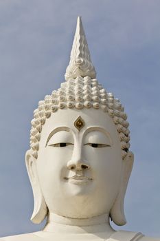 white face buddha image in temple Thailand