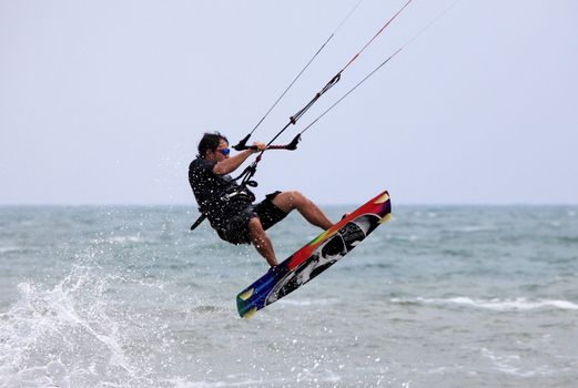 Kiteboarder enjoy surfing in water. Vietnam