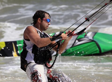 Kiteboarder enjoy surfing in water. Vietnam