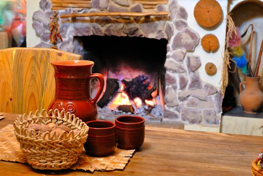 comfort of home hearth with a jug of wine