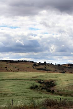 View of a cloudy sky on a typical Algarve landscape on it's interior region.