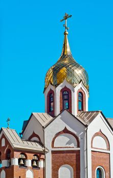 Domes of orthodox church against the blue sky