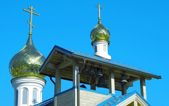 Domes of orthodox church against the dark blue sky