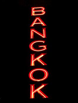 Red Bangkok sign on pure black background