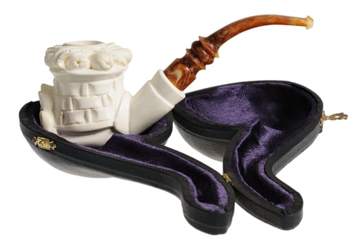 Tobacco pipe from meerschaum on a stand. Isolated on white.