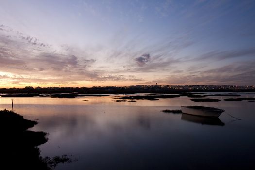 View of a beautiful sunset on the Ria Formosa region on the Algarve, Portugal.