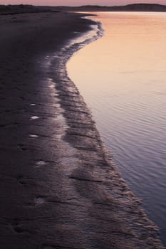 Beautiful sunset on a beach in the Algarve, Portugal.