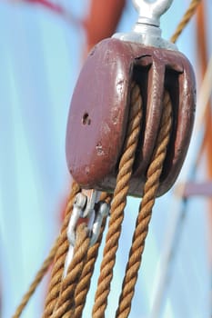 Wooden pulley with rope