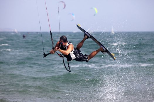 Kiteboarder enjoy surfing in water. Vietnam